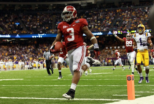 NEW ORLEANS, LA - JANUARY 09:  Trent Richardson #3 of the Alabama Crimson Tide celebrates after scoring a touchdown in the fourth quarter against the Louisiana State University Tigers during the 2012 Allstate BCS National Championship Game at Mercedes-Benz Superdome on January 9, 2012 in New Orleans, Louisiana.  (Photo by Ronald Martinez/Getty Images)