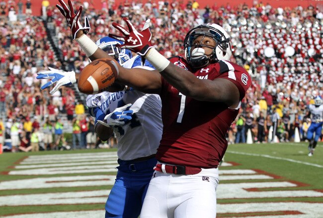 COLUMBIA, SC - OCTOBER 08:  Anthony Mosley #14 of the Kentucky Wildcats breaks up a pass to Alshon Jeffery #1 of the South Carolina Gamecocks during their game at Williams-Brice Stadium on October 8, 2011 in Columbia, South Carolina.  (Photo by Streeter Lecka/Getty Images)