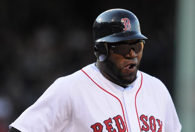BOSTON, MA - SEPTEMBER 18: David Ortiz #34 of the Boston Red Sox grimaces after making an out in the eighth inning against the Tampa Bay Rays at Fenway Park on September 18, 2011 in Boston, Massachusetts. The Rays won the game 8-5. (Photo by Darren McCollester/Getty Images)