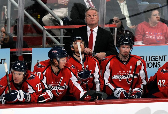 WASHINGTON, DC - DECEMBER 13:  Head coach Dale Hunter of the Washington Capitals looks up at the scoreboard during the game against the Philadelphia Flyers at the Verizon Center on December 13, 2011 in Washington, DC. Philadelphia won the game 5-1.  (Photo by Greg Fiume/Getty Images)