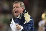 STANFORD, CA - NOVEMBER 26:  Notre Dame Fighting Irish head coach Brian Kelly stands on the sideline during their game against the Stanford Cardinal at Stanford Stadium on November 26, 2011 in Stanford, California.  (Photo by Ezra Shaw/Getty Images)