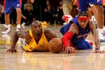 LOS ANGELES, CA - NOVEMBER 14: Kobe Bryant #24 of the Los Angeles Lakers and Allen Iverson #1 of the Detroit Pistons dive for a loose ball on November 14, 2008 at Staples Center in Los Angeles, California. The Pistons won 106-95.   NOTE TO USER: User expressly acknowledges and agrees that, by downloading and/or using this Photograph, user is consenting to the terms and conditions of the Getty Images License Agreement.  (Photo by Stephen Dunn/Getty Images)