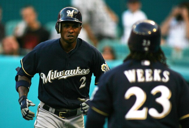 MIAMI GARDENS, FL - JUNE 04:  Nyjer Morgan #2 of the Milwaukee Brewers celebrates a home run with teammate Rickie Weeks against the Florida Marlins at Sun Life Stadium on June 4, 2011 in Miami Gardens, Florida.  (Photo by Marc Serota/Getty Images)