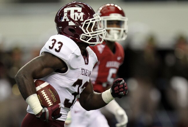 ARLINGTON, TX - OCTOBER 01:  Christine Michael #33 of the Texas A&M Aggies runs for a touchdown against the Arkansas Razorbacks at Cowboys Stadium on October 1, 2011 in Arlington, Texas.  (Photo by Ronald Martinez/Getty Images)
