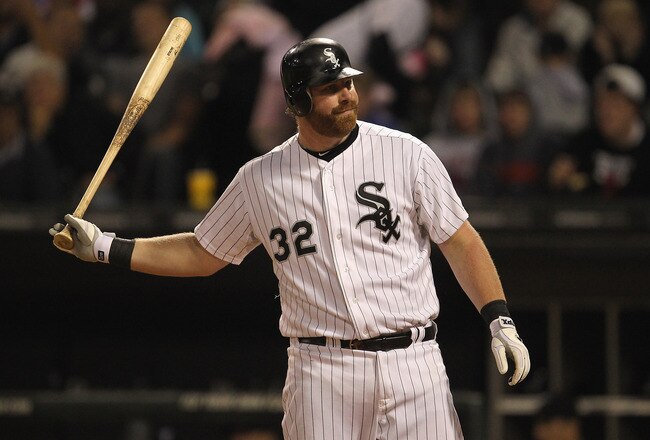 CHICAGO, IL - SEPTEMBER 27: Adam Dunn #32 of the Chicago White Sox throws his bat after striking out against the Toronto Blue Jays at U.S. Cellular Field on September 27, 2011 in Chicago, Illinois. (Photo by Jonathan Daniel/Getty Images)