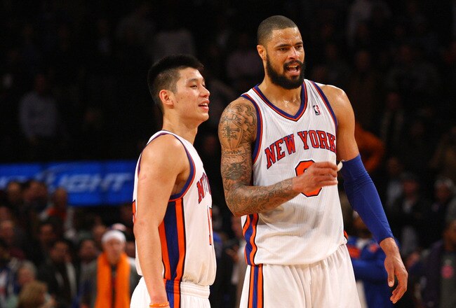 NEW YORK, NY - FEBRUARY 10:  (L-R) Jeremy Lin #17 and Tyson Chandler #6 of the New York Knicks look on against the Los Angeles Lakers at Madison Square Garden on February 10, 2012 in New York City.  NOTE TO USER: User expressly acknowledges and agrees that, by downloading and or using this photograph, User is consenting to the terms and conditions of the Getty Images License Agreement.  (Photo by Chris Chambers/Getty Images)