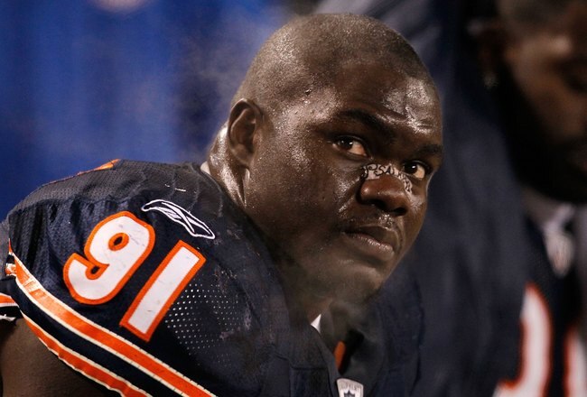 CHICAGO - DECEMBER 28: Tommie Harris #91 of the Chicago Bears rests on the bench during a game against the Minnesota Vikings at Soldier Field on December 28, 2009 in Chicago, Illinois. The Bears defeated the Vikings 36-30 in overtime. (Photo by Jonathan Daniel/Getty Images)