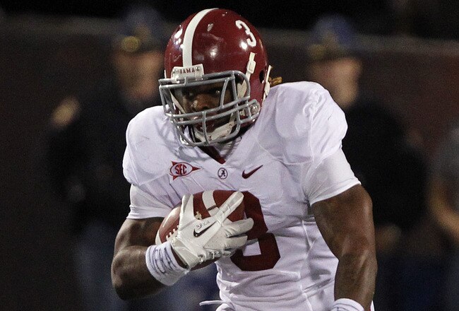 STARKVILLE, MS - NOVEMBER 12:  Running back Trent Richardson #3 of the Alabama Crimson Tide runs for a first down against Mississippi State in the first quarter on November 12, 2011 at Davis Wade Stadium in Starkville, Mississippi. (Photo by Butch Dill/Getty Images)