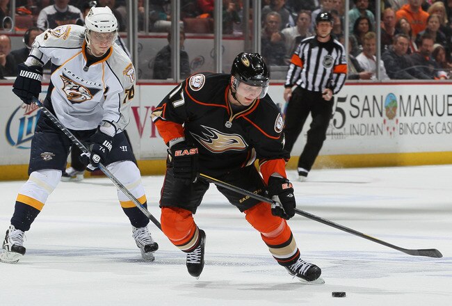 ANAHEIM, CA - APRIL 13:  Lubomir Visnovsky #17 of the Anaheim Ducks is pursued by Sergei Kostitsyn #74 of the Nashville Predators for the puck in the first period of Game One of the Western Conference Quarterfinals during the 2011 NHL Stanley Cup Playoffs at Honda Center on April 13, 2011 in Anaheim, California.  (Photo by Jeff Gross/Getty Images)