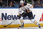 UNIONDALE, NY - FEBRUARY 04:  Drew Stafford #21 of the Buffalo Sabres skates against the New York Islanders at the Nassau Veterans Memorial Coliseum on February 4, 2012 in Uniondale, New York. The Sabres defeated the Islanders 4-3 in the shootout.  (Photo by Bruce Bennett/Getty Images)