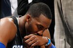 ATLANTA, GA - APRIL 28:  Dwight Howard #12 of the Orlando Magic sits on the bench during a timeout before the final seconds against the Atlanta Hawks during Game Six of the Eastern Conference Quarterfinals in the 2011 NBA Playoffs at Philips Arena on April 28, 2011 in Atlanta, Georgia.  NOTE TO USER: User expressly acknowledges and agrees that, by downloading and or using this photograph, User is consenting to the terms and conditions of the Getty Images License Agreement.  (Photo by Kevin C. Cox/Getty Images)