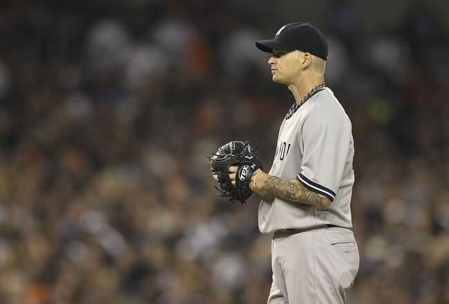 DETROIT, MI - OCTOBER 04:  A J Burnett #34 of the New York Yankees pitches in the sixth inning during Game Four of the American League Divison Series against the Detroit Tigers at Comerica Park on October 4, 2011 in Detroit, Michigan. The Yankees defeated the Tigers 10-1.  (Photo by Leon Halip/Getty Images)