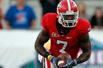 JACKSONVILLE, FL - OCTOBER 30:  Orson Charles #7 of the Georgia Bulldogs runs for yardage during the game against the Florida Gators at EverBank Field on October 30, 2010 in Jacksonville, Florida.  (Photo by Sam Greenwood/Getty Images)