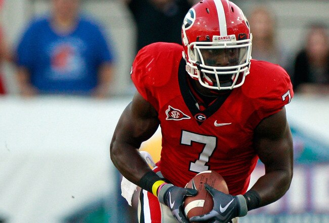 JACKSONVILLE, FL - OCTOBER 30:  Orson Charles #7 of the Georgia Bulldogs runs for yardage during the game against the Florida Gators at EverBank Field on October 30, 2010 in Jacksonville, Florida.  (Photo by Sam Greenwood/Getty Images)