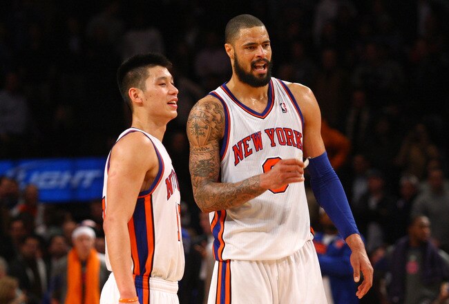 NEW YORK, NY - FEBRUARY 10:  (L-R) Jeremy Lin #17 and Tyson Chandler #6 of the New York Knicks look on against the Los Angeles Lakers at Madison Square Garden on February 10, 2012 in New York City.  NOTE TO USER: User expressly acknowledges and agrees that, by downloading and or using this photograph, User is consenting to the terms and conditions of the Getty Images License Agreement.  (Photo by Chris Chambers/Getty Images)