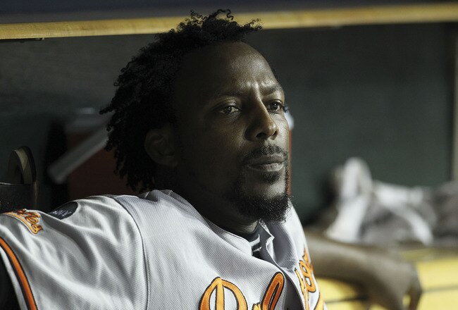DETROIT - SEPTEMBER 22: Vladimir Guerrero #27 of the Baltimore Orioles watches the action from the dugout during the game against the Detroit Tigers at Comerica Park on September 22, 2011 in Detroit, Michigan. The Orioles defeated the Tigers 6-5. (Photo by Leon Halip/Getty Images)