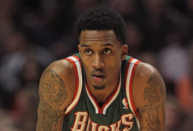 CHICAGO, IL - JANUARY 27:  Brandon Jennings #3 of the Milwaukee Bucks waits as a player for the Chicago Bulls shoots a free-throw at the United Center on January 27, 2012 in Chicago, Illinois. The Bulls defeated the Bucks 107-100. NOTE TO USER: User expressly acknowledges and agrees that, by downloading and or using this photograph, User is consenting to the terms and conditions of the Getty Images License Agreement.  (Photo by Jonathan Daniel/Getty Images)