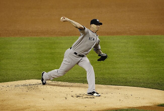 DETROIT, MI - OCTOBER 04:  A J Burnett #34 of the New York Yankees pitches in the first inning during Game Four of the American League Divison Series against the Detroit Tigers at Comerica Park on October 4, 2011 in Detroit, Michigan. The Yankees defeated the Tigers 10-1.  (Photo by Leon Halip/Getty Images)