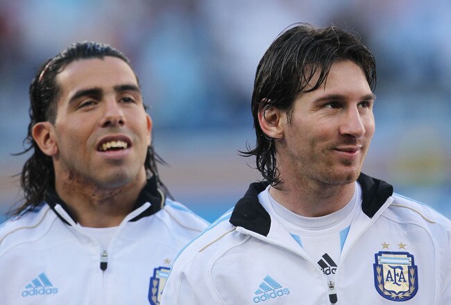 CAPE TOWN, SOUTH AFRICA - JULY 03:  Carlos Tevez and Lionel Messi of Argentina ahead of the 2010 FIFA World Cup South Africa Quarter Final match between Argentina and Germany at Green Point Stadium on July 3, 2010 in Cape Town, South Africa.  (Photo by Chris McGrath/Getty Images)
