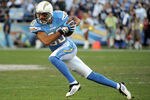 SAN DIEGO, CA - NOVEMBER 27:   Vincent Jackson #83 of the San Diego Chargers turns up field after his catch against the Denver Broncos at Qualcomm Stadium on November 27, 2011 in San Diego, California. The Broncos went on to win 16-13.   (Photo by Harry How/Getty Images)