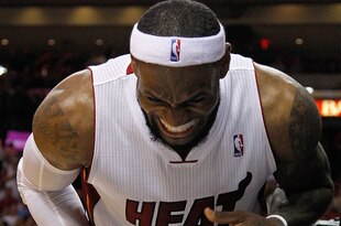 MIAMI, FL - JANUARY 27:  LeBron James #6 of the Miami Heat reacts to jamming his finger during a game against the New York Knicks at American Airlines Arena on January 27, 2012 in Miami, Florida. NOTE TO USER: User expressly acknowledges and agrees that, by downloading and/or using this Photograph, User is consenting to the terms and conditions of the Getty Images License Agreement.  (Photo by Mike Ehrmann/Getty Images)