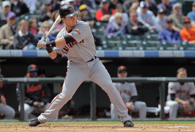 DENVER, CO - APRIL 20:  Catcher Buster Posey #28 of the San Francisco Giants takes an at bat against the Colorado Rockies at Coors Field on April 20, 2011 in Denver, Colorado.  (Photo by Doug Pensinger/Getty Images)