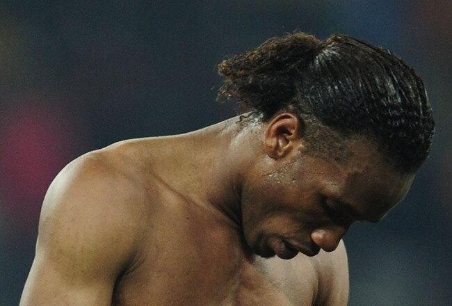 NELSPRUIT, SOUTH AFRICA - JUNE 25:  Dejected Didier Drogba of the Ivory Coast after victory in the game but elimination from the tournament during the 2010 FIFA World Cup South Africa Group G match between North Korea and Ivory Coast at the Mbombela Stadium on June 25, 2010 in Nelspruit, South Africa.  (Photo by Clive Mason/Getty Images)