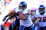BALTIMORE, MD - JANUARY 15:  Arian Foster #23 of the Houston Texans runs the ball against the Baltimore Ravens during the second quarter of the AFC Divisional playoff game at M&T Bank Stadium on January 15, 2012 in Baltimore, Maryland. Baltimore won 20-13 in regulation. (Photo by Chris Trotman/Getty Images)