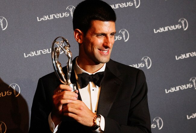 LONDON, ENGLAND - FEBRUARY 06:  Tennis Player Novak Djokovic poses with his Laureus World Sportsman of the Year trophy in the press room at the 2012 Laureus World Sports Awards at Queen Elizabeth II Conference Centre on February 6, 2012 in London, England.  (Photo by Tom Dulat/Getty Images for Laureus)