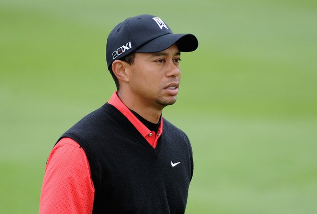 PEBBLE BEACH, CA - FEBRUARY 12:  Tiger Woods watches play on the second fairway during the final round of the AT&T Pebble Beach National Pro-Am at Pebble Beach Golf Links on February 12, 2012 in Pebble Beach, California.  (Photo by Harry How/Getty Images)