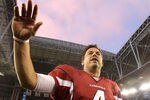GLENDALE, AZ - DECEMBER 04:  Quarterback Kevin Kolb #4 of the Arizona Cardinals walks off the field following the NFL game against the Dallas Cowboys at the University of Phoenix Stadium on December 4, 2011 in Glendale, Arizona.  The Cardinals defeated the Cowboys 19-13 in overtime.  (Photo by Christian Petersen/Getty Images)