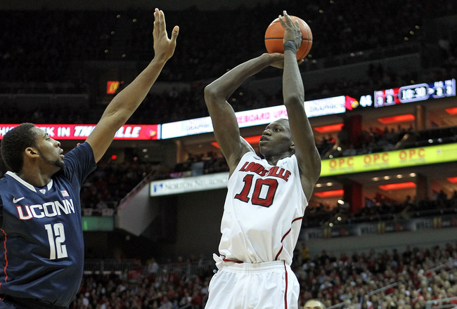 LOUISVILLE, KY - FEBRUARY 06:  Gorgui Dieng #10 of the Louisville Cardinals shoots the ball during the Big East Conference game against the Connecticut Huskies at KFC YUM! Center on February 6, 2012 in Louisville, Kentucky.  (Photo by Andy Lyons/Getty Images)