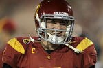 LOS ANGELES, CA - NOVEMBER 26:  Quarterback Matt Barkley #7 of the USC Trojans gets ready for the game with the UCLA Bruins at the Los Angeles Memorial Coliseum on November 26, 2011 in Los Angeles, California.  (Photo by Stephen Dunn/Getty Images)