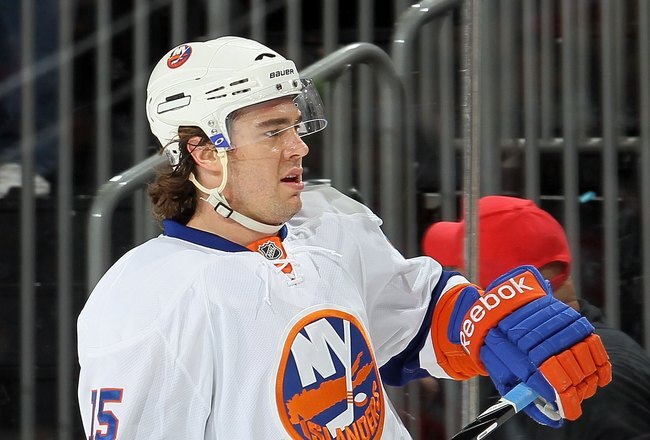 NEWARK, NJ - DECEMBER 23:  PA Parenteau #15 of the New York Islanders skates against the New Jersey Devils at the Prudential Center on December 23, 2010 in Newark, New Jersey. The Isles defeated the Devils 5-1.  (Photo by Jim McIsaac/Getty Images)