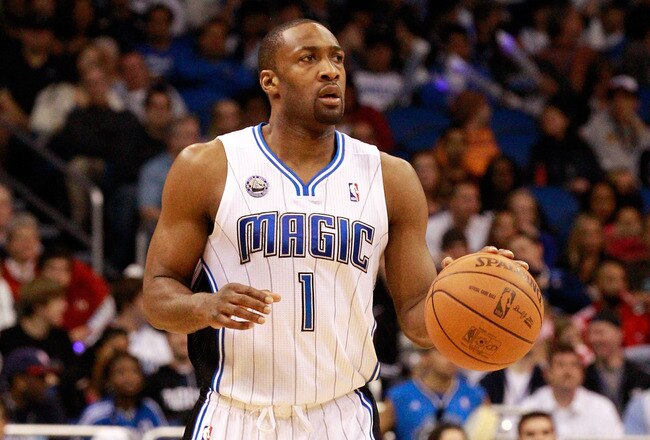 ORLANDO, FL - JANUARY 24:  Gilbert Arenas #1 of the Orlando Magic sets up a play during the game against the Detroit Pistons at Amway Arena on January 24, 2011 in Orlando, Florida.  NOTE TO USER: User expressly acknowledges and agrees that, by downloading and or using this Photograph, user is consenting to the terms and conditions of the Getty Images License Agreement.  (Photo by Sam Greenwood/Getty Images)