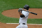 CHICAGO, IL - SEPTEMBER 14: Paul Konerko #14 of the Chicago White Sox hits a single to pick up his 99th and 100th RBI for the season against the Detroit Tigers at U.S. Cellular Field on September 14, 2011 in Chicago, Illinois. (Photo by Jonathan Daniel/Getty Images)