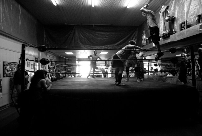 ELDON - JULY 5: Mike and Teddy Jr. train at the Harley Race's Wrestling School on July 5, 2006 in Eldon, Missouri. Harley Race's legendary wrestling career spanned nearly four decades. During that time Race won eight NWA World Championships, managed two wrestlers to the WCW World Championship and was involved in operating the NWA territories in Kansas City and St. Louis. Mike and Teddy DiBiase Jr. are the sons of world famous Ted DiBiase, better known as The Million Dollar Man in the wrestling world. (Photo by Ezra Shaw/Getty Images)