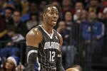 OKLAHOMA CITY, OK - DECEMBER 25:  Dwight Howard #12 of the Orlando Magic questions a call during the NBA season opening game against the Oklahoma City Thunder December 25, 2011 at the Chesapeake Energy Arena in Oklahoma City, Oklahoma.  Oklahoma City defeated Orlando 97-89. NOTE TO USER: User expressly acknowledges and agrees that, by downloading and or using this Photograph, user is consenting to the terms and conditions of the Getty Images License Agreement.  (Photo by Brett Deering/Getty Images)