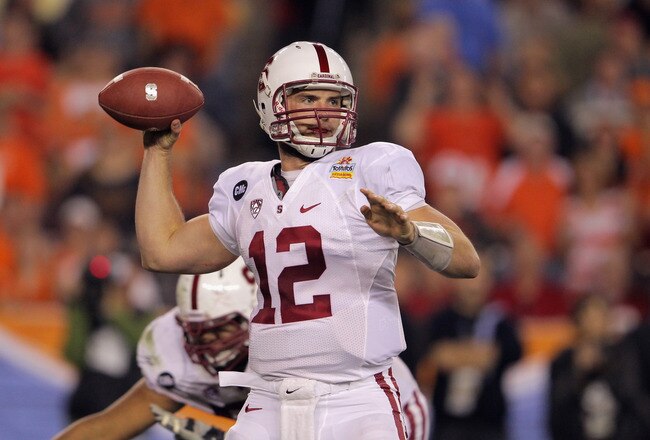 GLENDALE, AZ - JANUARY 02:  Andrew Luck #12 of the Stanford Cardinal throws a pass against the Oklahoma State Cowboys during the Tostitos Fiesta Bowl on January 2, 2012 at University of Phoenix Stadium in Glendale, Arizona.  (Photo by Doug Pensinger/Getty Images)