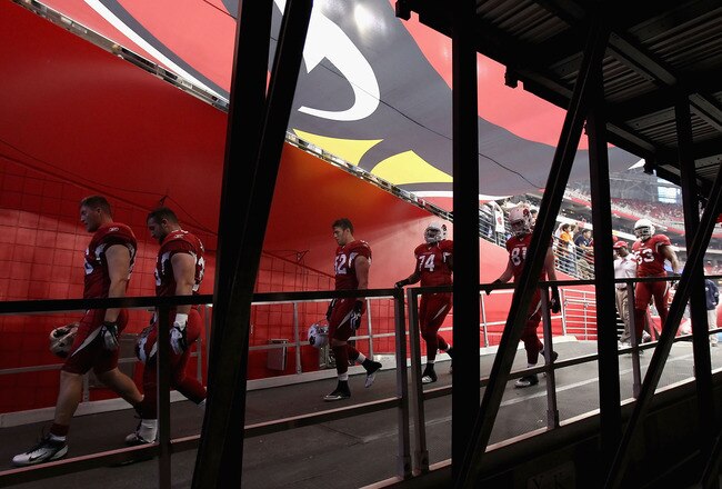 GLENDALE, AZ - JANUARY 01:  The Arizona Cardinals walk off the field following warm ups to the NFL game against the Seattle Seahawks at the University of Phoenix Stadium on January 1, 2012 in Glendale, Arizona.  (Photo by Christian Petersen/Getty Images)