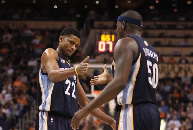 PHOENIX - DECEMBER 08:  Rudy Gay #22 of the Memphis Grizzlies high fives teammate Zach Randolph #50 after scoring against the Phoenix Suns during the NBA game at US Airways Center on December 8, 2010 in Phoenix, Arizona. The Grizzlies defeated the Suns 104-98 in overtime.  NOTE TO USER: User expressly acknowledges and agrees that, by downloading and or using this photograph, User is consenting to the terms and conditions of the Getty Images License Agreement.  (Photo by Christian Petersen/Getty Images)