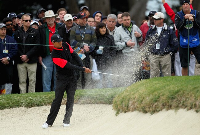 PEBBLE BEACH, CA - FEBRUARY 12: Tiger Woods hits from a greenside bunker on the 12th hole during the final round of the AT&T Pebble Beach National Pro-Am at Pebble Beach Golf Links on February 12, 2012 in Pebble Beach, California.  (Photo by Jeff Gross/Getty Images)