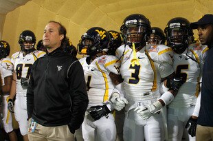 MIAMI GARDENS, FL - JANUARY 04:  (L-R) Head coach Dana Holgorsen, Tavon Austin #1 and Stedman Bailey #3 of the West Virginia Mountaineers wait in the tunnel prior to running onto the field to take on the Clemson Tigers during the Discover Orange Bowl at Sun Life Stadium on January 4, 2012 in Miami Gardens, Florida.  (Photo by Mike Ehrmann/Getty Images)