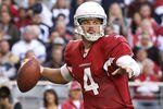 GLENDALE, AZ - DECEMBER 04:  Quarterback Kevin Kolb #4 of the Arizona Cardinals scrambles with the football during the NFL game against the Dallas Cowboys at the University of Phoenix Stadium on December 4, 2011 in Glendale, Arizona.  The Cardinals defeated the Cowboys 19-13 in overtime.  (Photo by Christian Petersen/Getty Images)