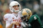 WACO, TX - DECEMBER 03:  Case McCoy #6 of the Texas Longhorns is hit by Ahmad Dixon #6 of the Baylor Bears during a game at Floyd Casey Stadium on December 3, 2011 in Waco, Texas.  (Photo by Sarah Glenn/Getty Images)