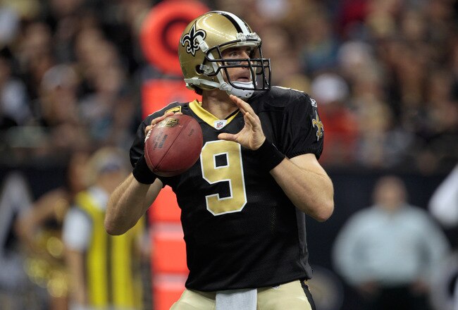NEW ORLEANS, LA - JANUARY 01:   Drew Brees #9 of the New Orleans Saints looks to throw a pass during the game against the Carolina Panthers at the Mercedes-Benz Superdome on January 1, 2012 in New Orleans, Louisiana.  (Photo by Chris Graythen/Getty Images)