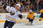 NASHVILLE, TN - DECEMBER 03: Derek Roy #9 of the Buffalo Sabres celebrates the game wining goal against Anders Lindback #39 of the Nashville Predators at the Bridgestone Arena on December 3, 2011 in Nashville, Tennessee.  (Photo by Frederick Breedon/Getty Images)