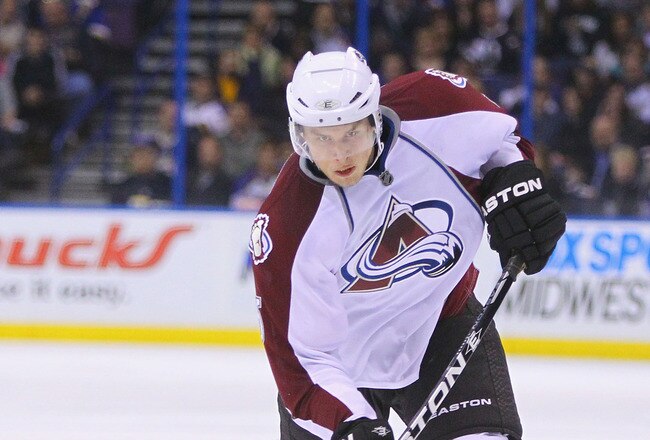 ST. LOUIS, MO - APRIL 5: Erik Johnson #6 of the Colorado Avalanche takes a shot on goal against the St. Louis Blues at the Scottrade Center on April 5, 2011 in St. Louis, Missouri.  (Photo by Dilip Vishwanat/Getty Images)