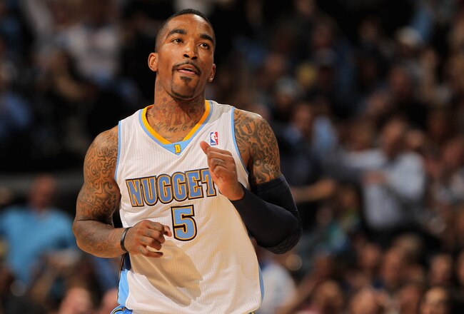 DENVER, CO - APRIL 23:  J.R. Smith #5 of the Denver Nuggets celebrates a three point shot against the Oklahoma City Thunder in Game Three of the Western Conference Quarterfinals in the 2011 NBA Playoffs on April 23, 2011 at the Pepsi Center in Denver, Colorado. NOTE TO USER: User expressly acknowledges and agrees that, by downloading and or using this photograph, User is consenting to the terms and conditions of the Getty Images License Agreement.  (Photo by Doug Pensinger/Getty Images)