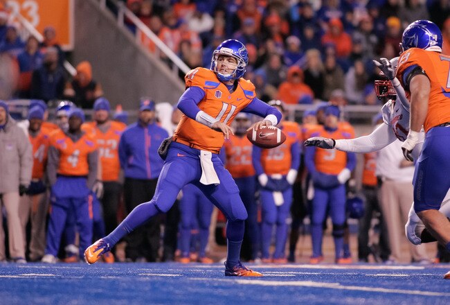 BOISE, ID - DECEMBER 03: Kellen Moore #11 of the Boise State Broncos passes against the New Mexico Lobos at Bronco Stadium on December 3, 2011 in Boise, Idaho.  (Photo by Otto Kitsinger III/Getty Images)